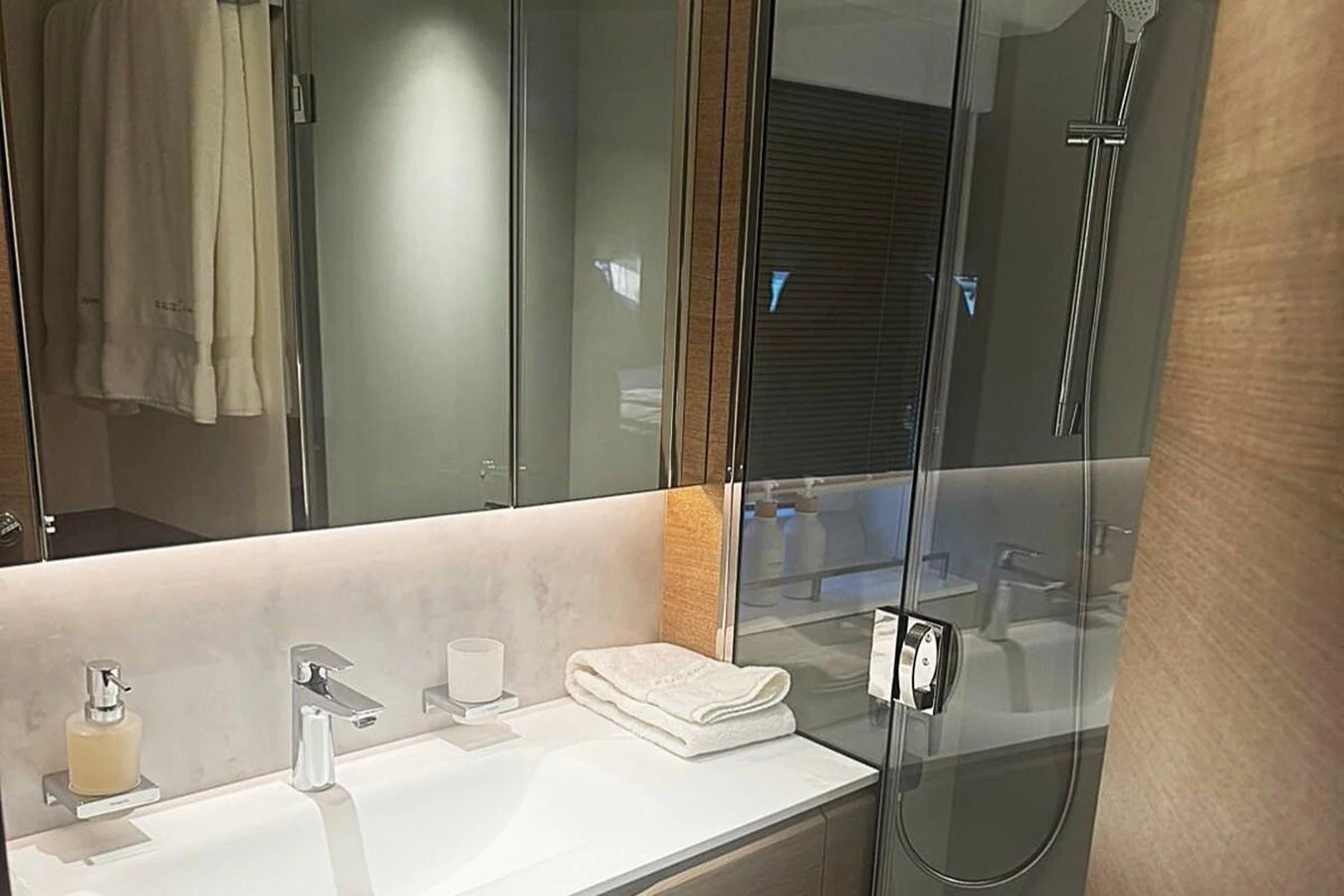 a bathroom with a large mirror aboard SOLOMON Yacht for Sale