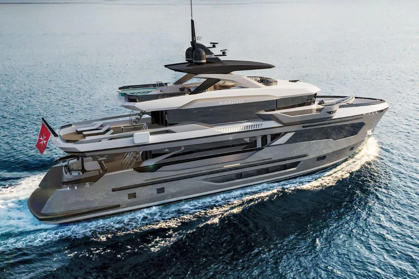 A sleek and modern yacht cruises gracefully on the open water, showcasing its luxurious design and spacious decks. aboard KANDO 110 Yacht for Sale