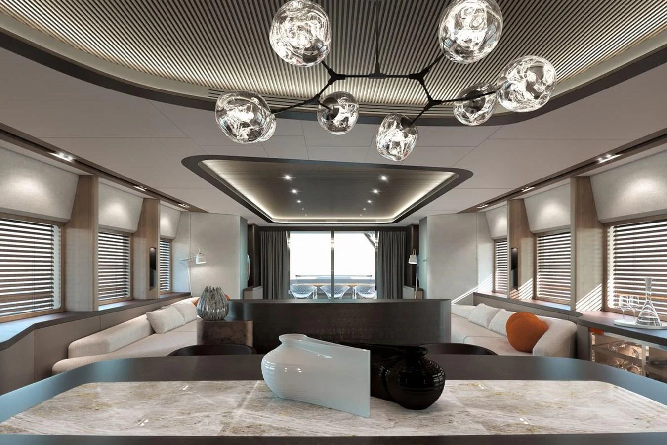 The yacht's interior features a modern, spacious lounge area with elegant lighting and luxurious furnishings. aboard KANDO 110 Yacht for Sale