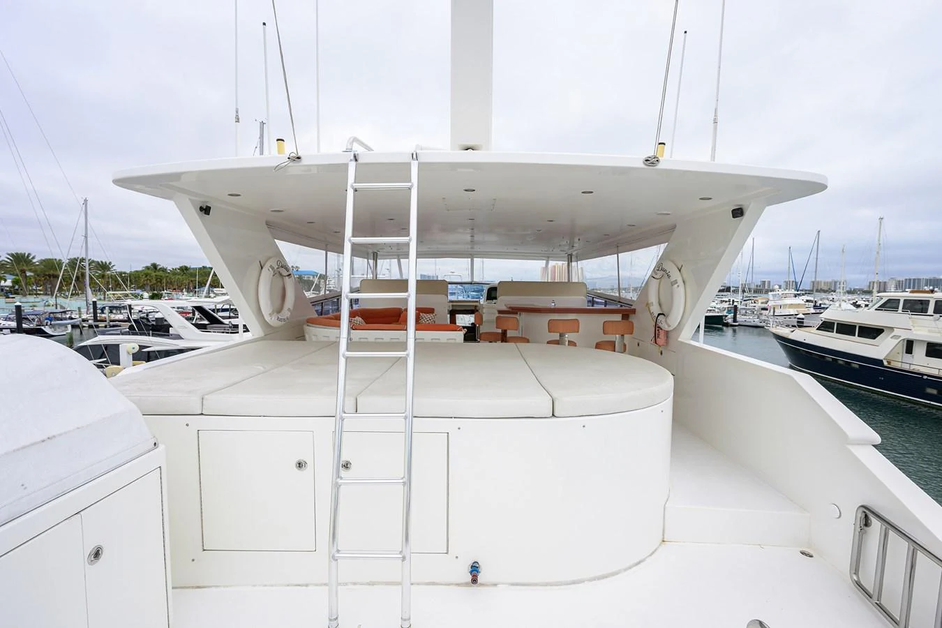 a white boat with a white roof aboard DUNIA Yacht for Sale
