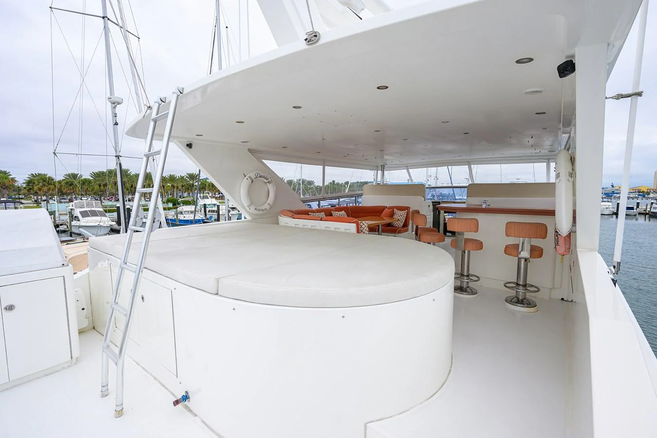a white boat in a large room aboard DUNIA Yacht for Sale