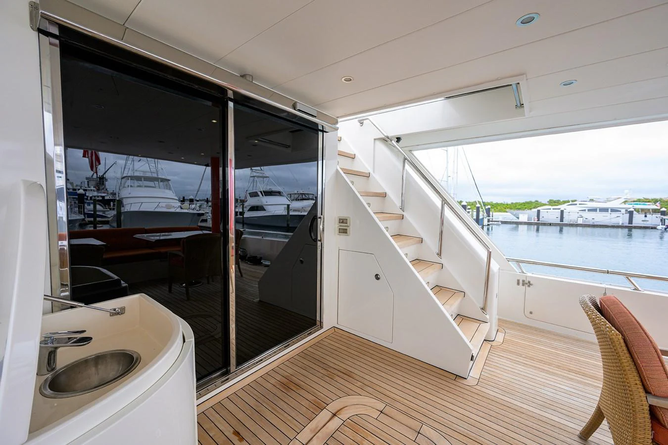 a room with a sink and a staircase aboard DUNIA Yacht for Sale