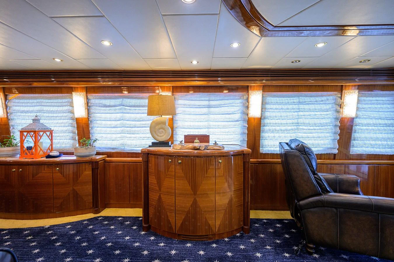 a room with a chair and a desk aboard DUNIA Yacht for Sale
