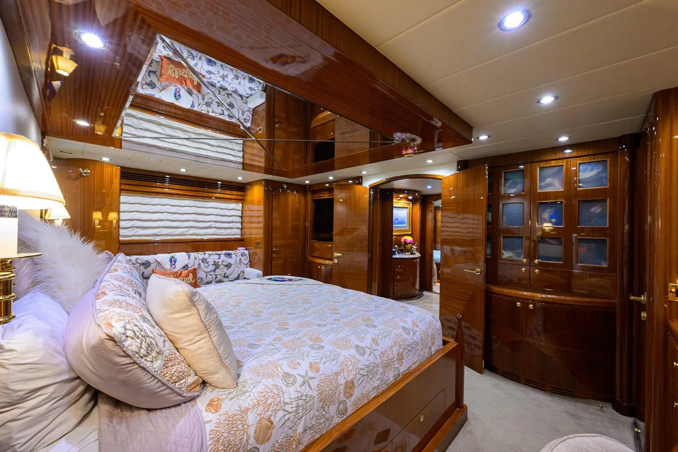 a bed with a white sheet aboard DUNIA Yacht for Sale