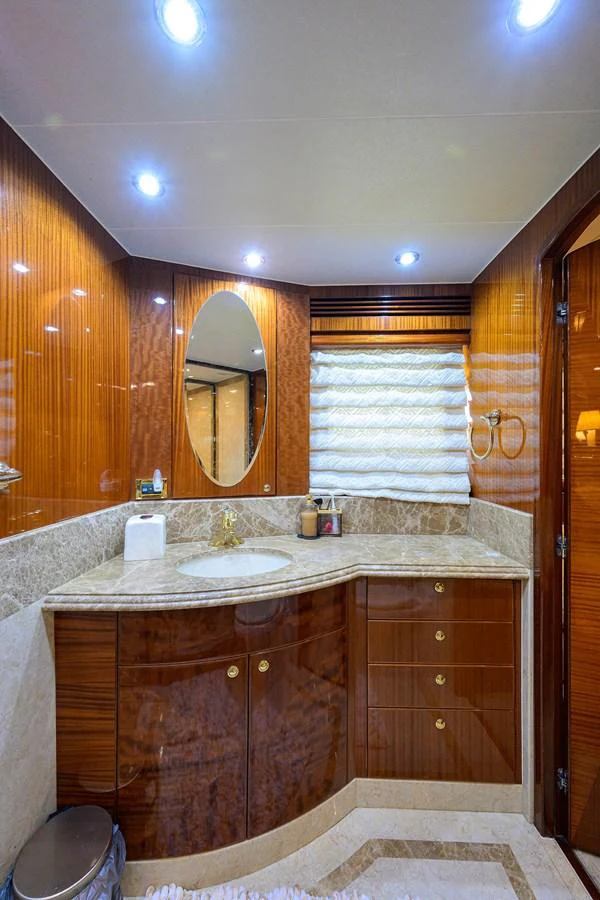 a bathroom with a large mirror aboard DUNIA Yacht for Sale