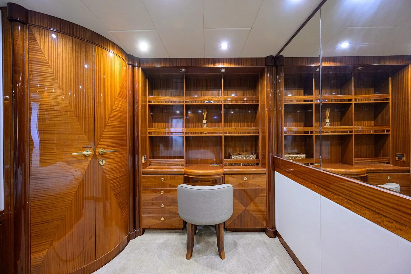 a room with a chair and a desk aboard DUNIA Yacht for Sale