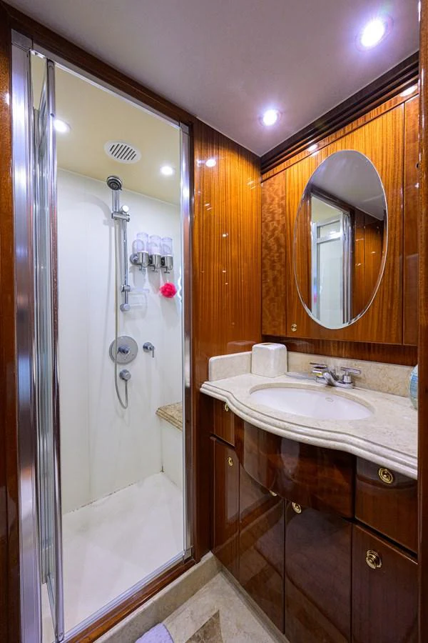 a bathroom with a sink and a shower aboard DUNIA Yacht for Sale