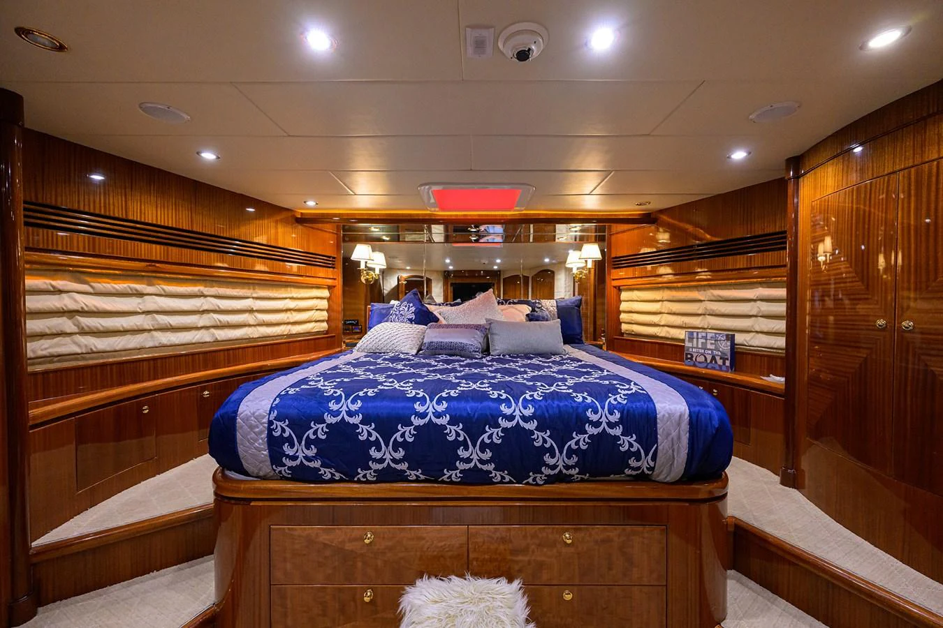 a bed in a room aboard DUNIA Yacht for Sale