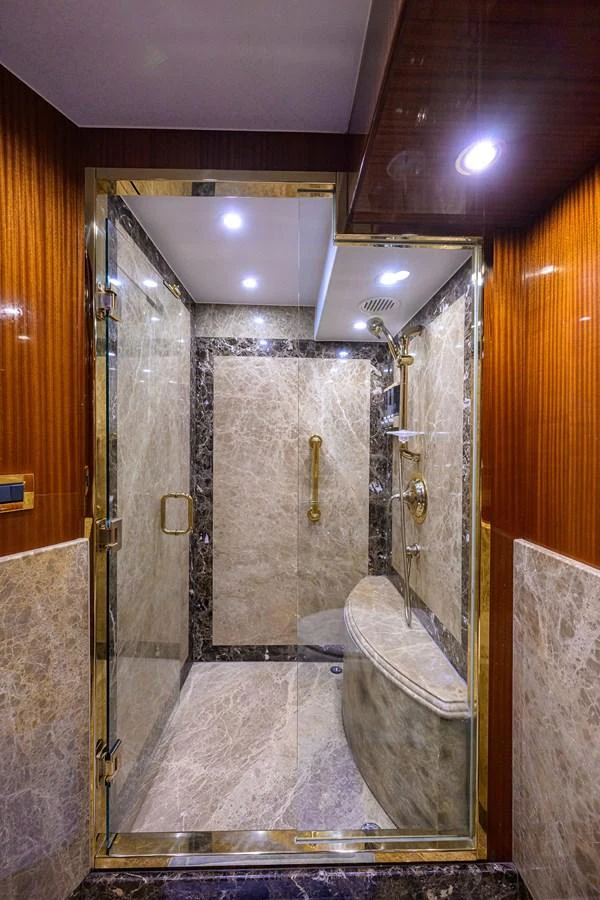 a bathroom with a shower aboard DUNIA Yacht for Sale