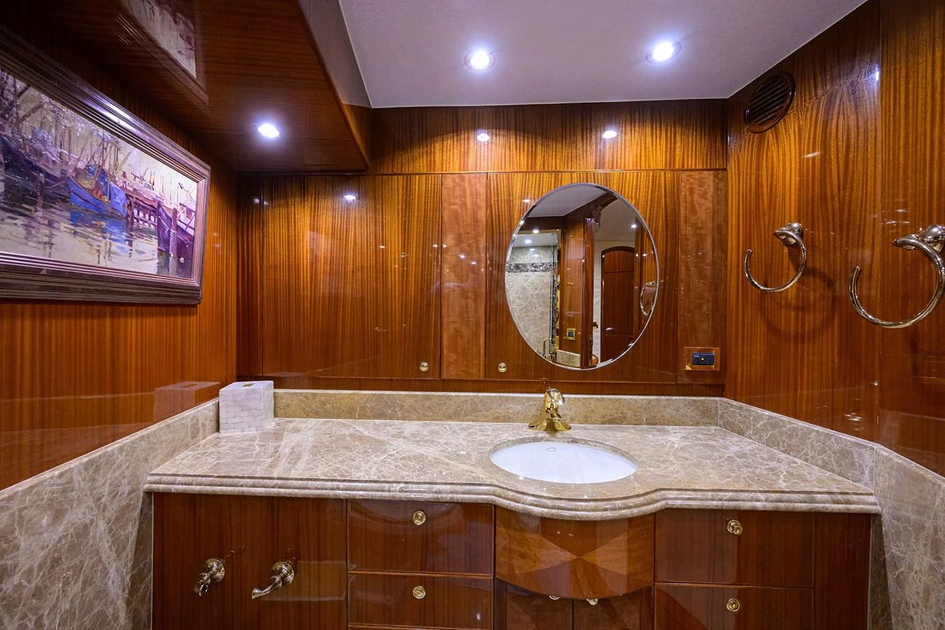 a bathroom with a large mirror aboard DUNIA Yacht for Sale