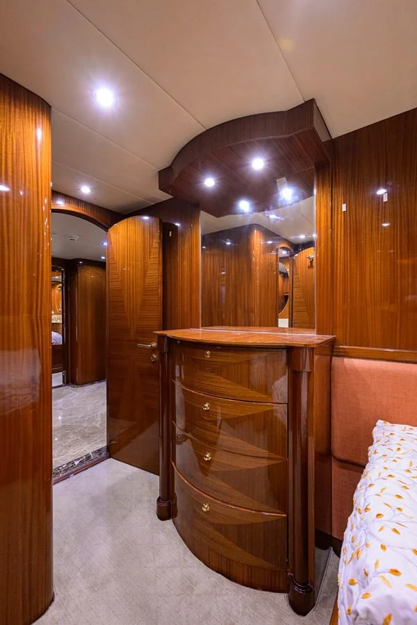a room with a fireplace aboard DUNIA Yacht for Sale
