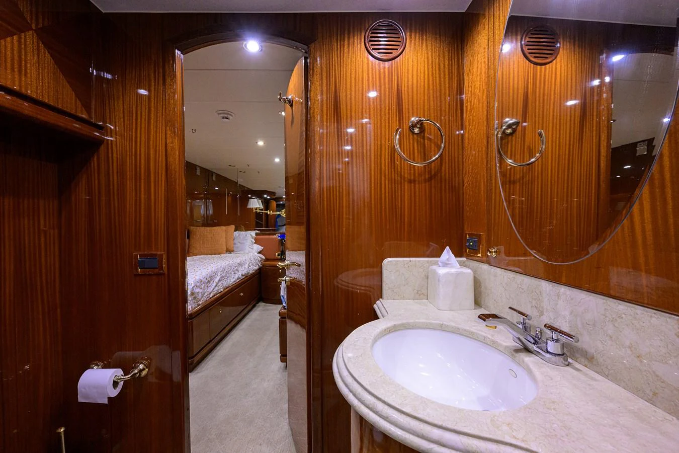 a bathroom with a sink and a mirror aboard DUNIA Yacht for Sale