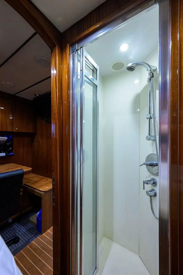 a shower with a glass door aboard DUNIA Yacht for Sale
