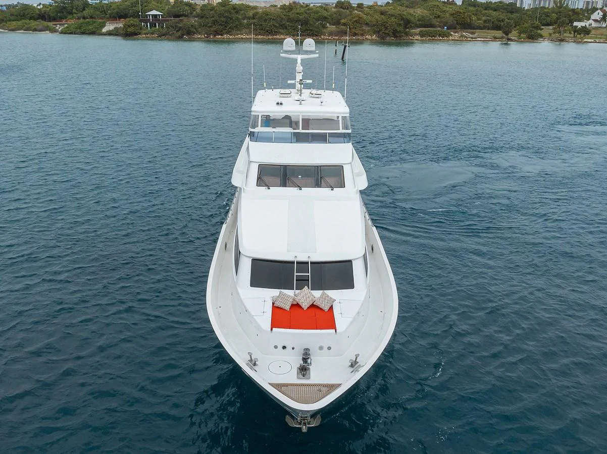 a white boat on the water aboard DUNIA Yacht for Sale