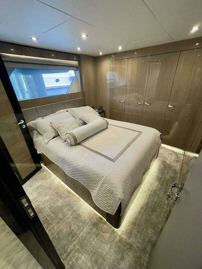 a bed in a room aboard SCORPIO II Yacht for Sale