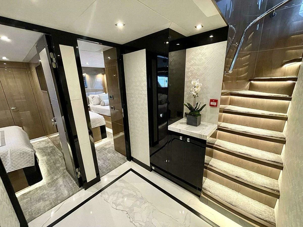 a hallway with a glass door aboard SCORPIO II Yacht for Sale