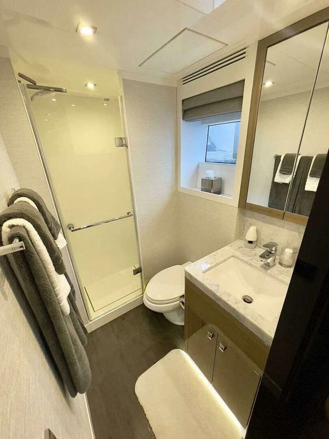 a bathroom with a sink and a toilet aboard SCORPIO II Yacht for Sale