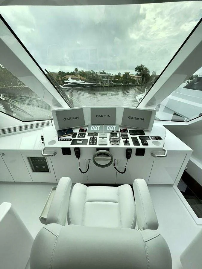 inside of a car aboard SCORPIO II Yacht for Sale