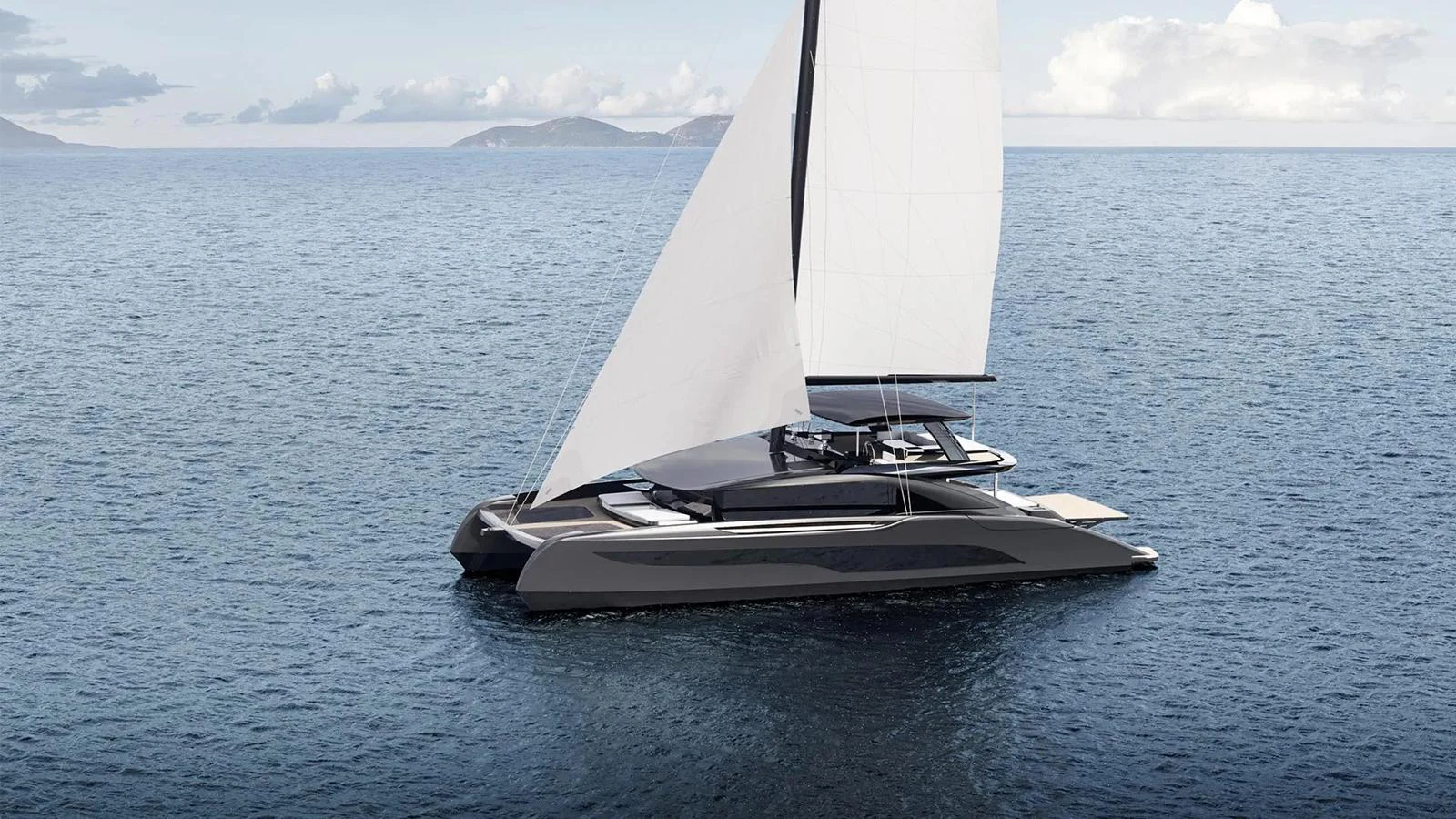 A sleek and modern sailing yacht glides gracefully on calm waters with its sails fully extended. aboard SUNREEF 100 INFINITY Yacht for Sale