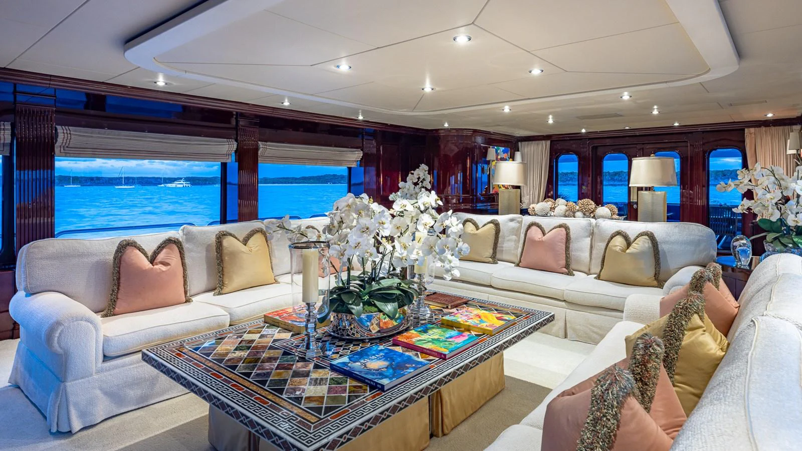 a living room with a large window aboard LADY JOY Yacht for Sale