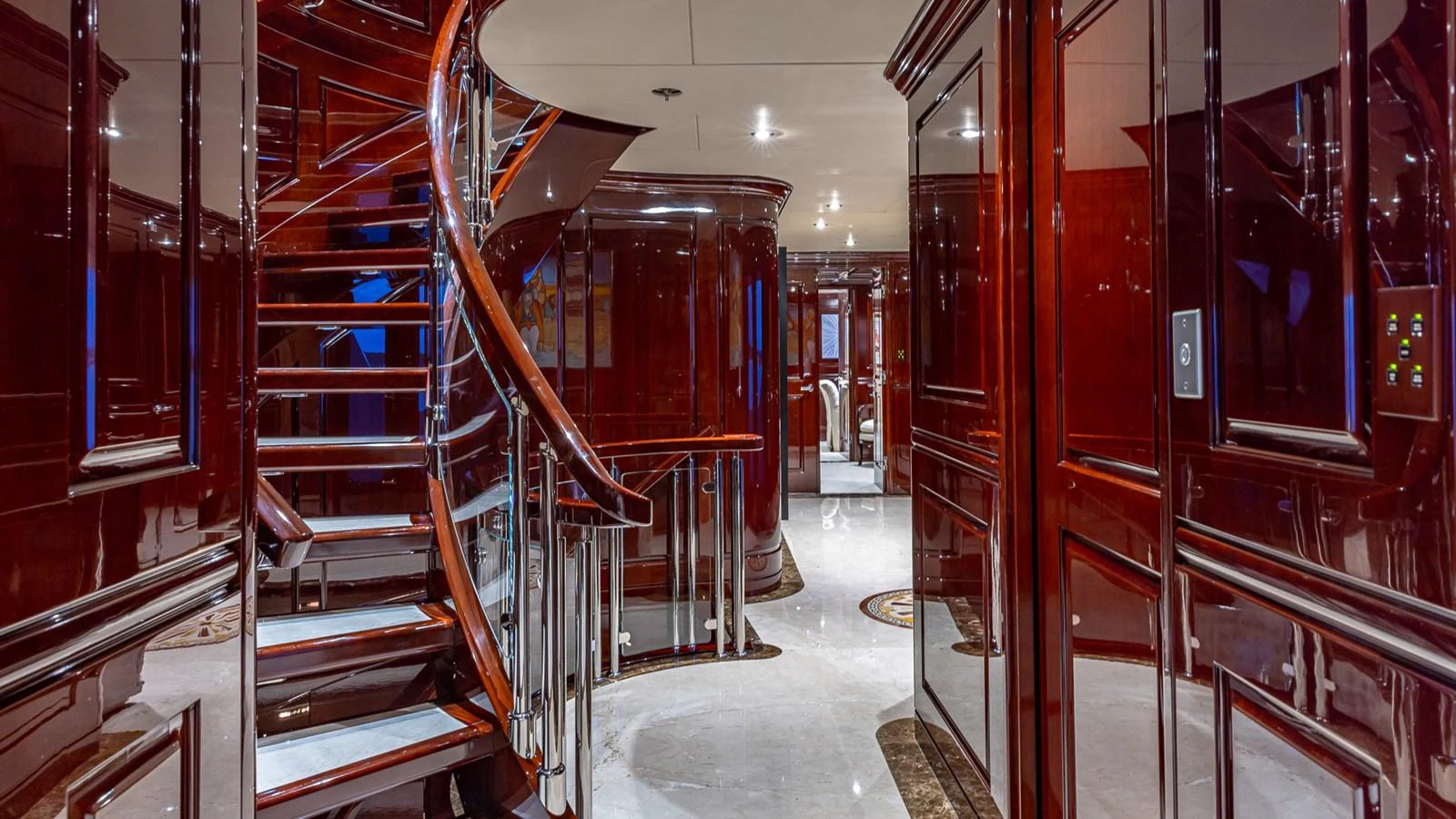 a room with shelves and a staircase aboard LADY JOY Yacht for Sale
