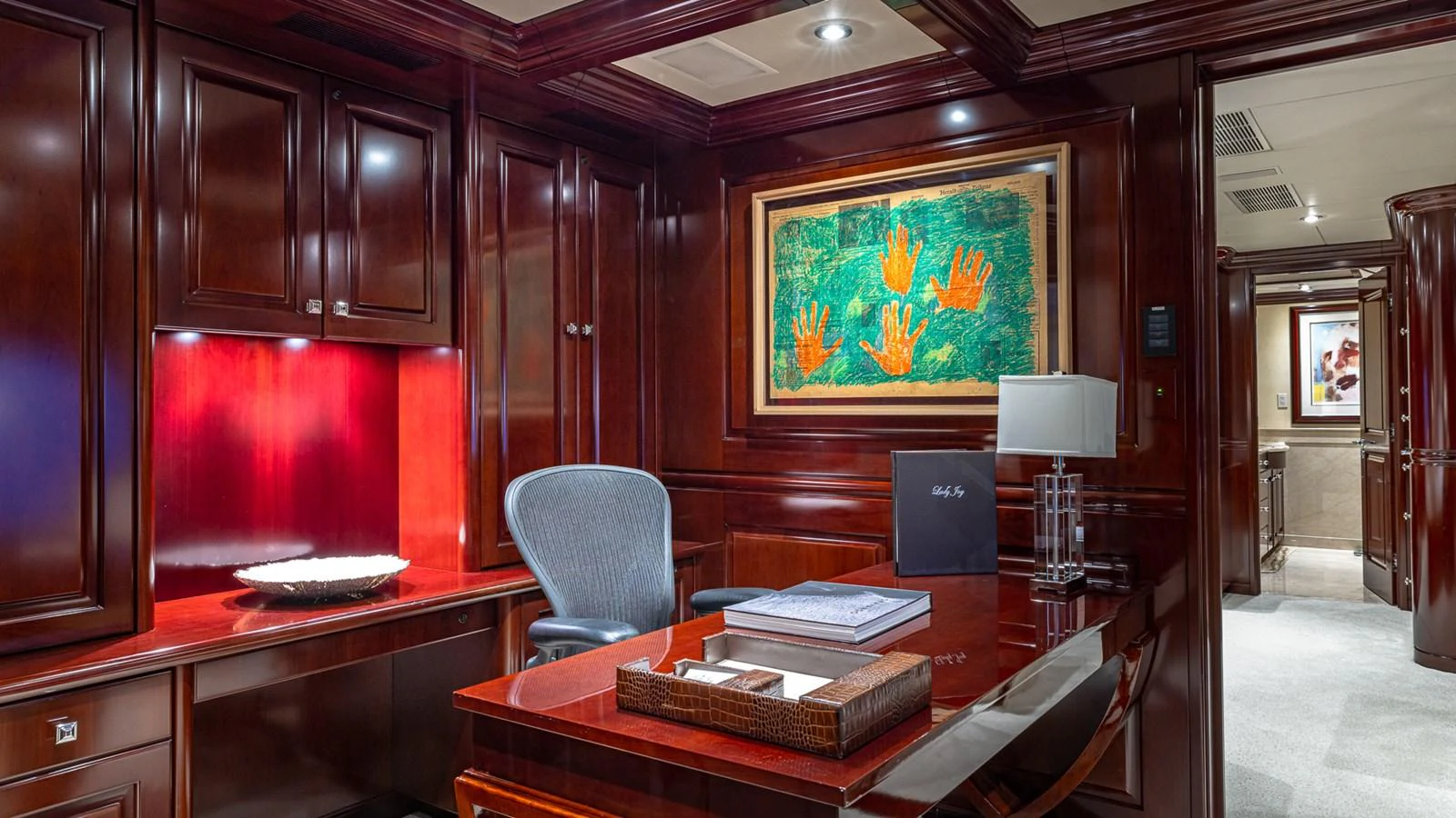 a room with a table and chairs aboard LADY JOY Yacht for Sale