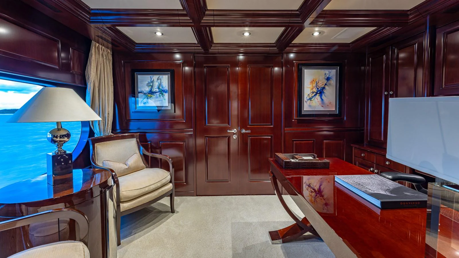 a room with a desk and a chair aboard LADY JOY Yacht for Sale
