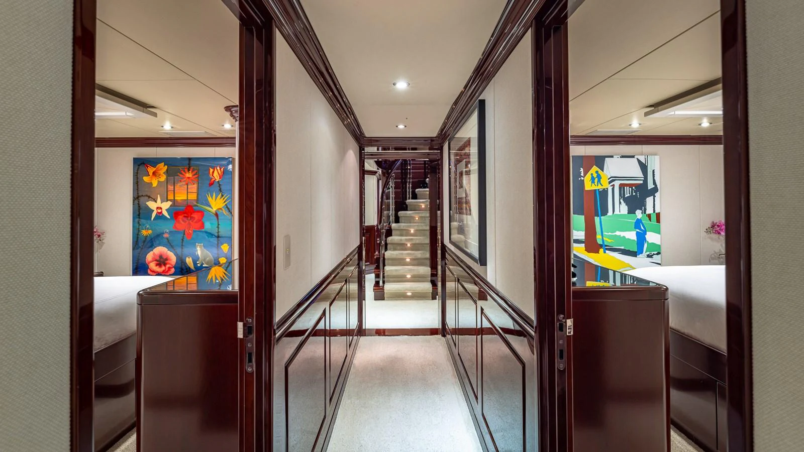 a hallway with a glass door aboard LADY JOY Yacht for Sale