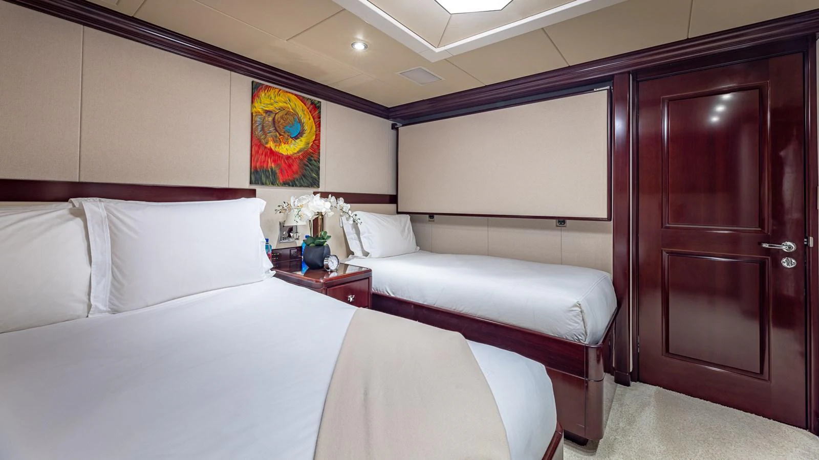 a room with two beds aboard LADY JOY Yacht for Sale
