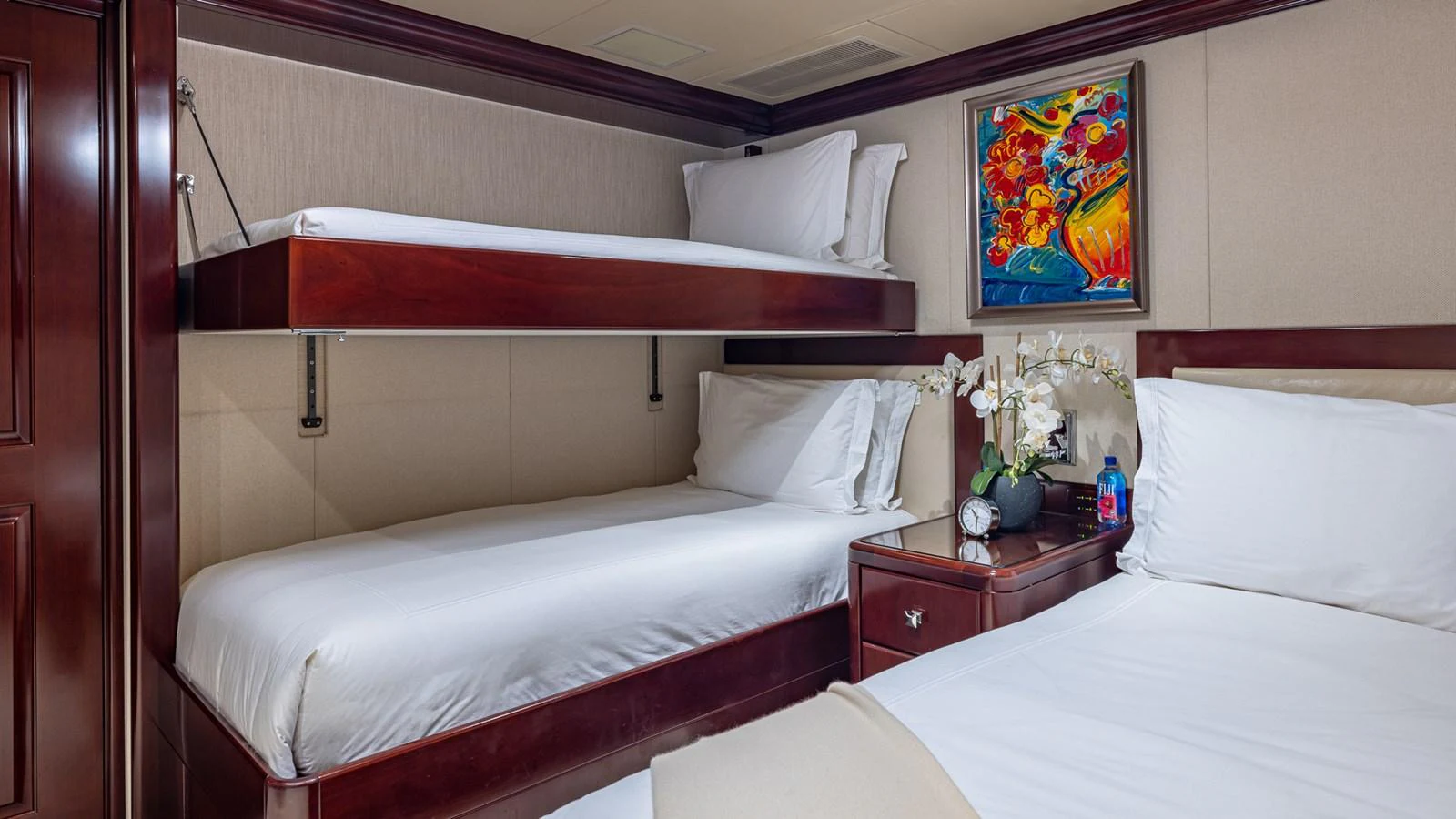 a room with two beds aboard LADY JOY Yacht for Sale