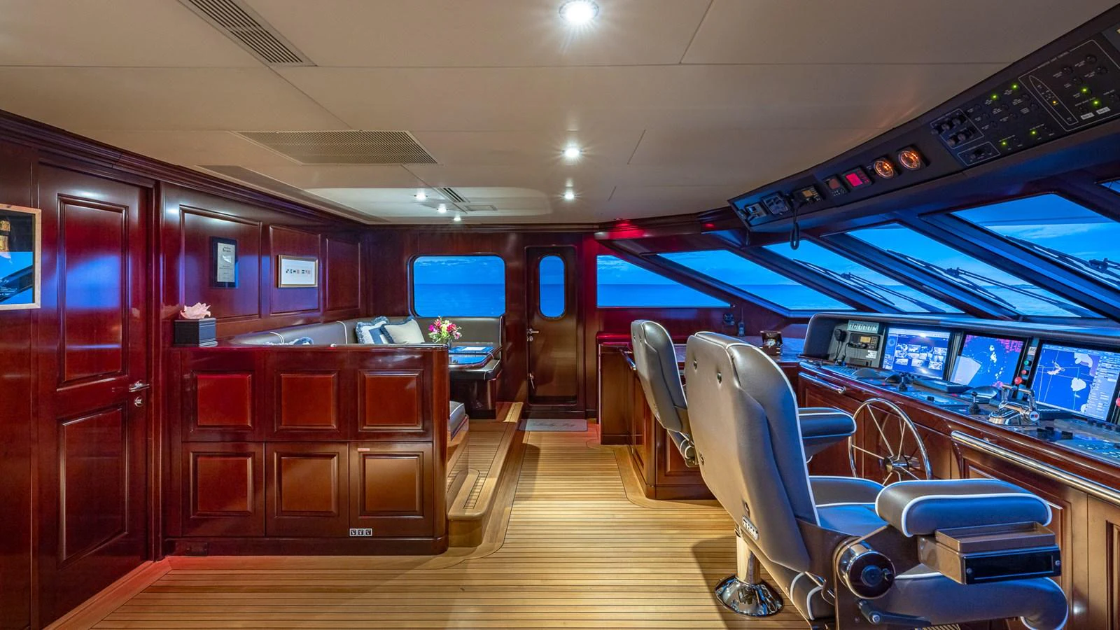 inside of a building with desks and chairs aboard LADY JOY Yacht for Sale