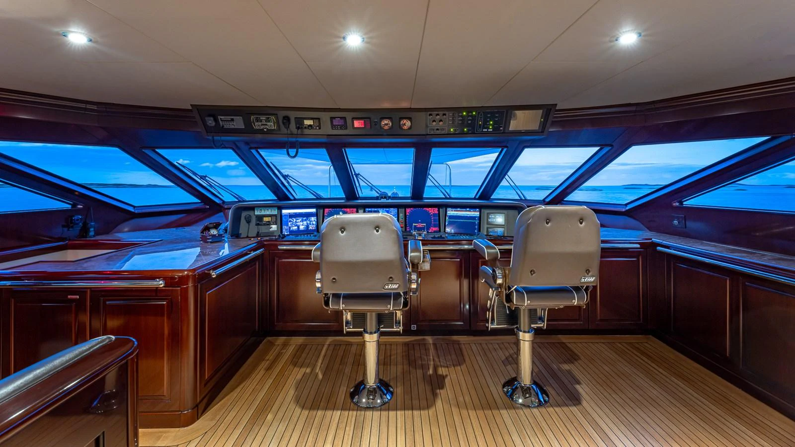 a room with a chair and a desk aboard LADY JOY Yacht for Sale