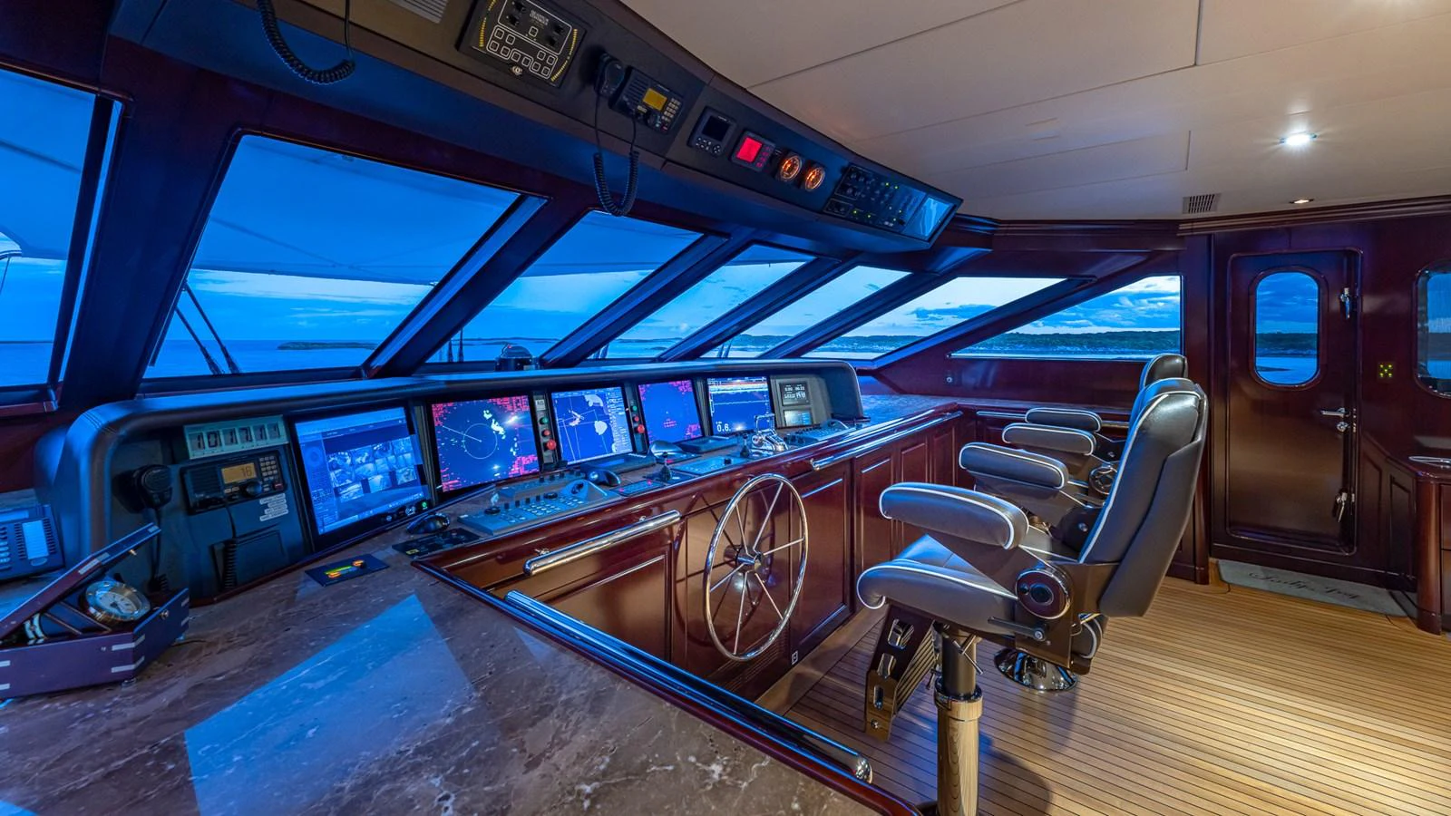 a car with a large screen aboard LADY JOY Yacht for Sale
