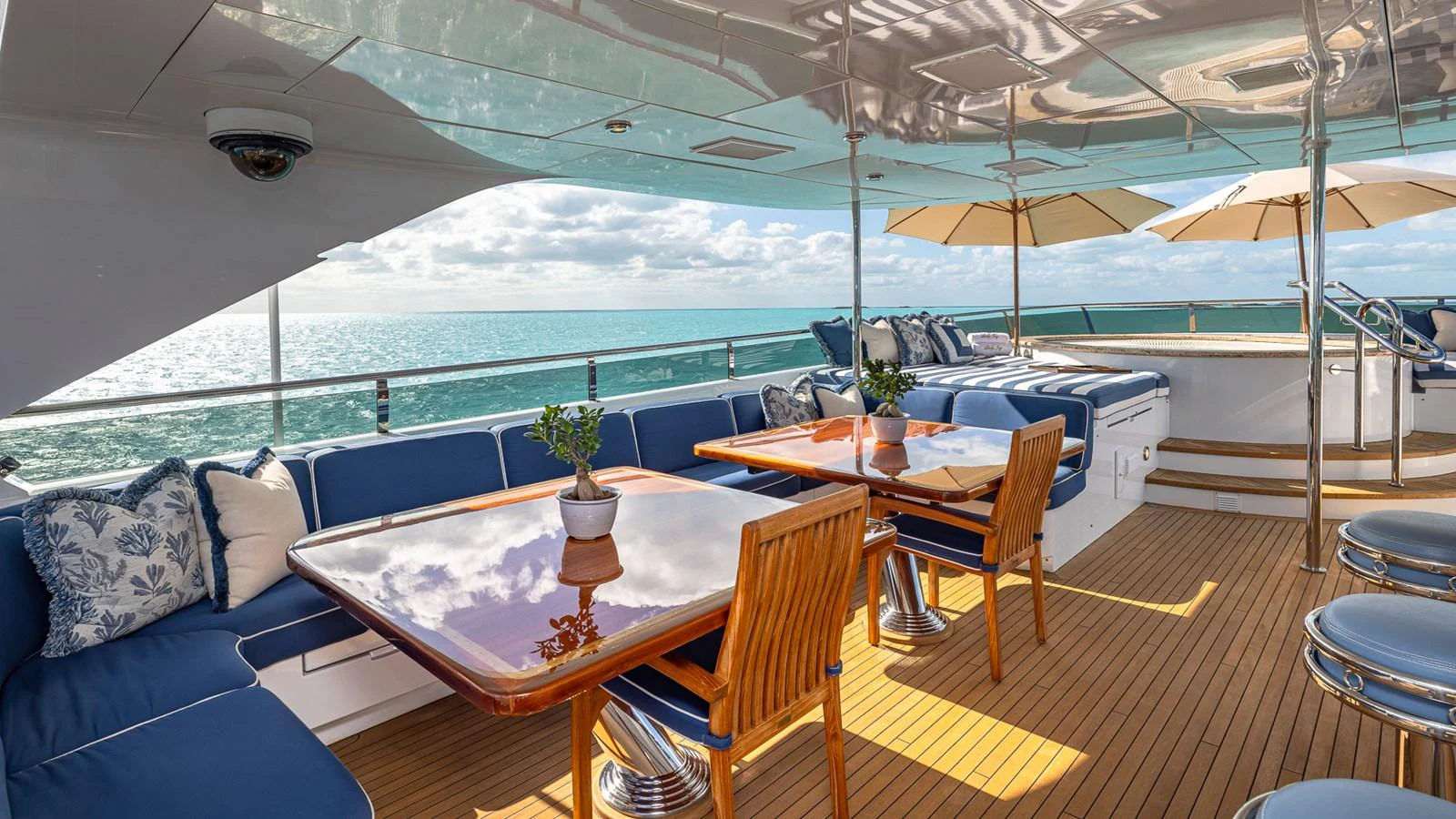 a large tent with a table and chairs and a table aboard LADY JOY Yacht for Sale