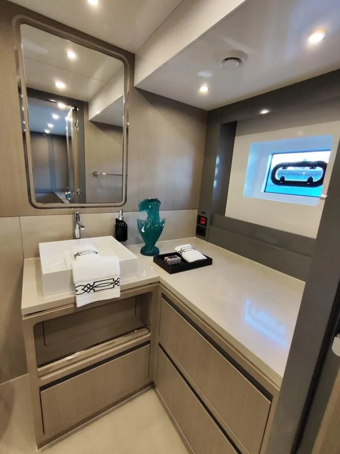 a bathroom with a large mirror aboard ARGA Yacht for Sale