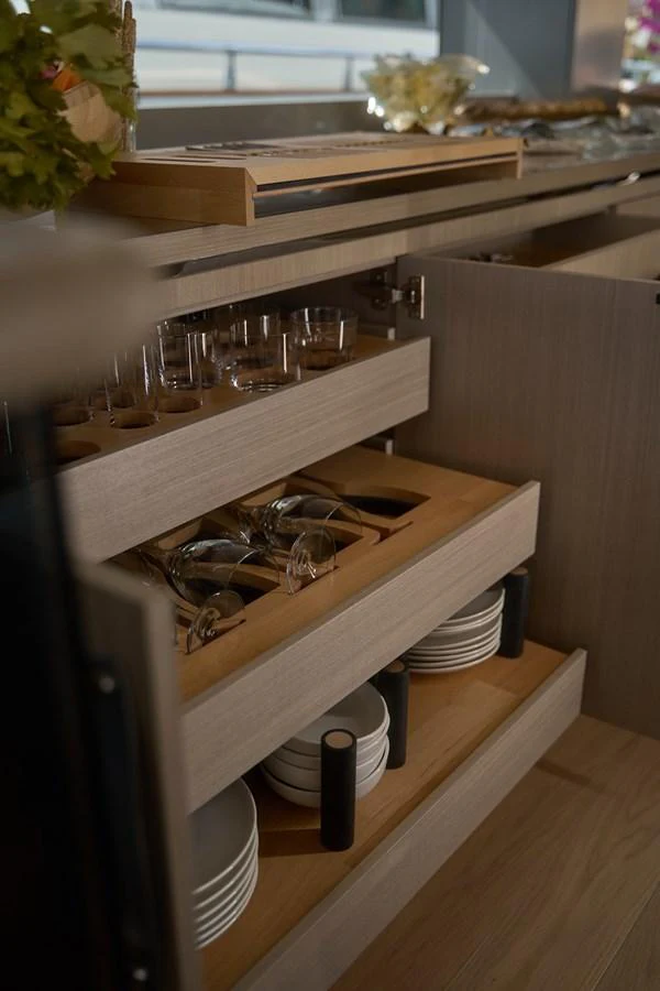 a shelf with wine glasses and a plant on it aboard ARGA Yacht for Sale