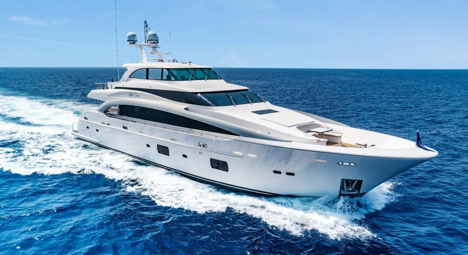 a white yacht on the water aboard WILD DUCK Yacht for Sale
