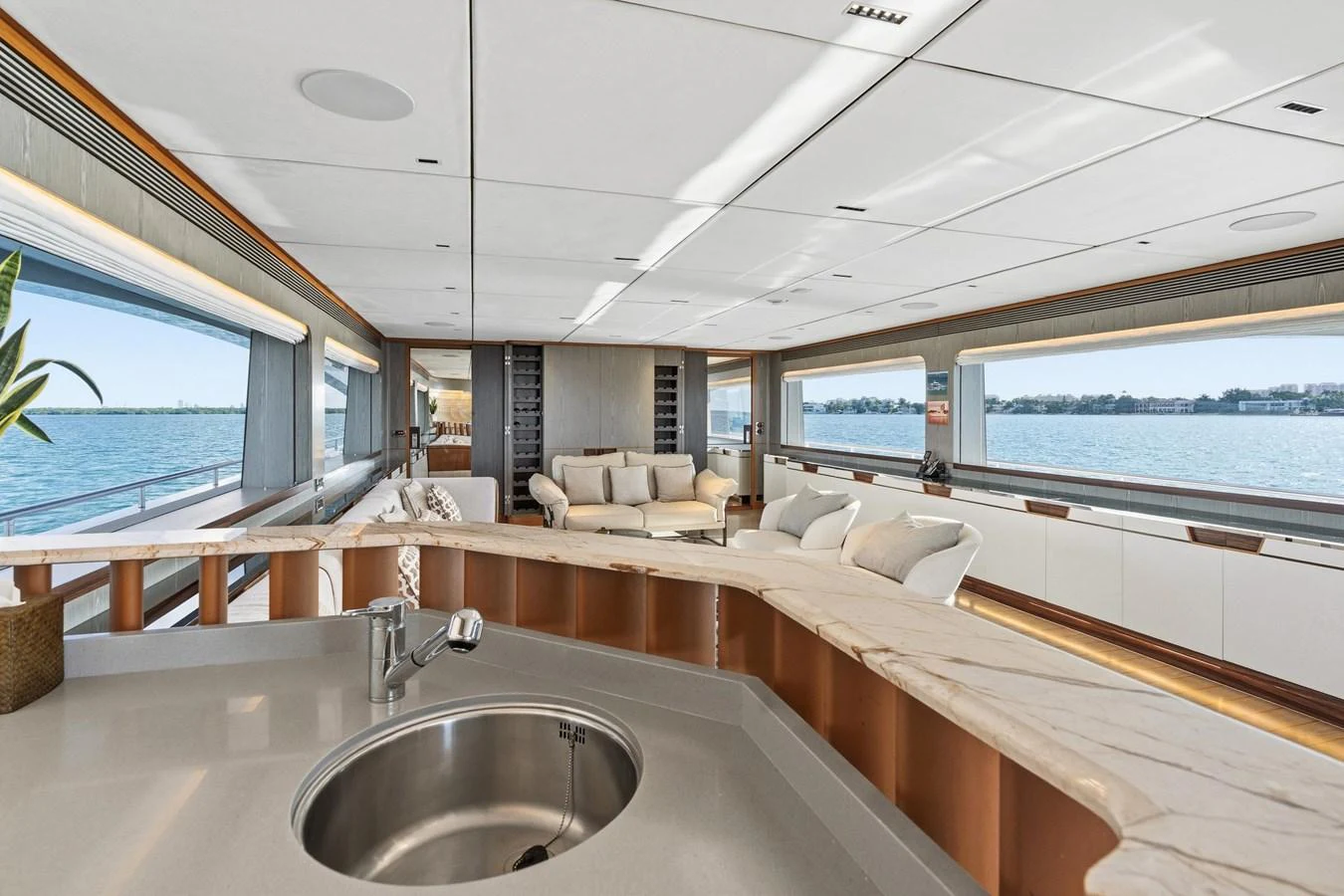 a modern kitchen with a large window aboard WILD DUCK Yacht for Sale