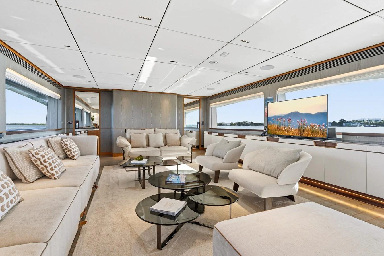 a living room with a large window aboard WILD DUCK Yacht for Sale