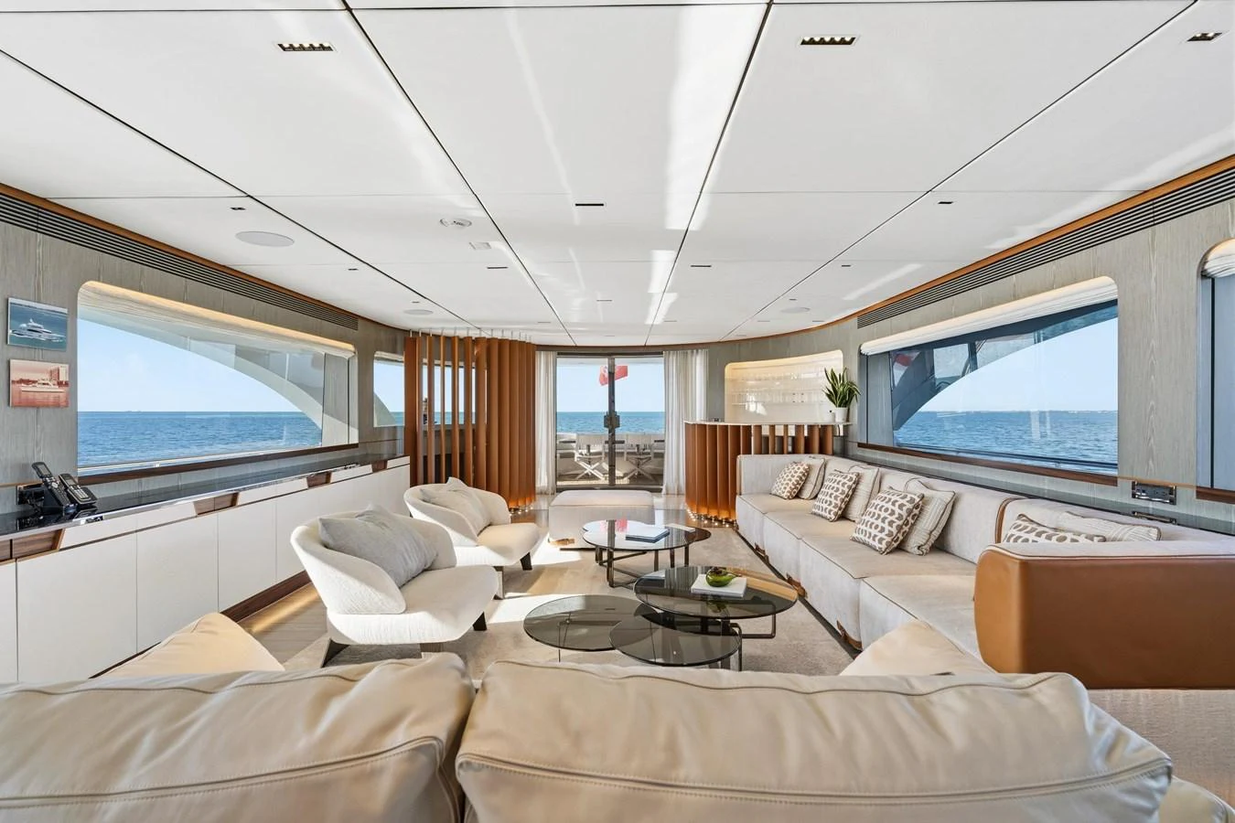 a living room with a large screen aboard WILD DUCK Yacht for Sale