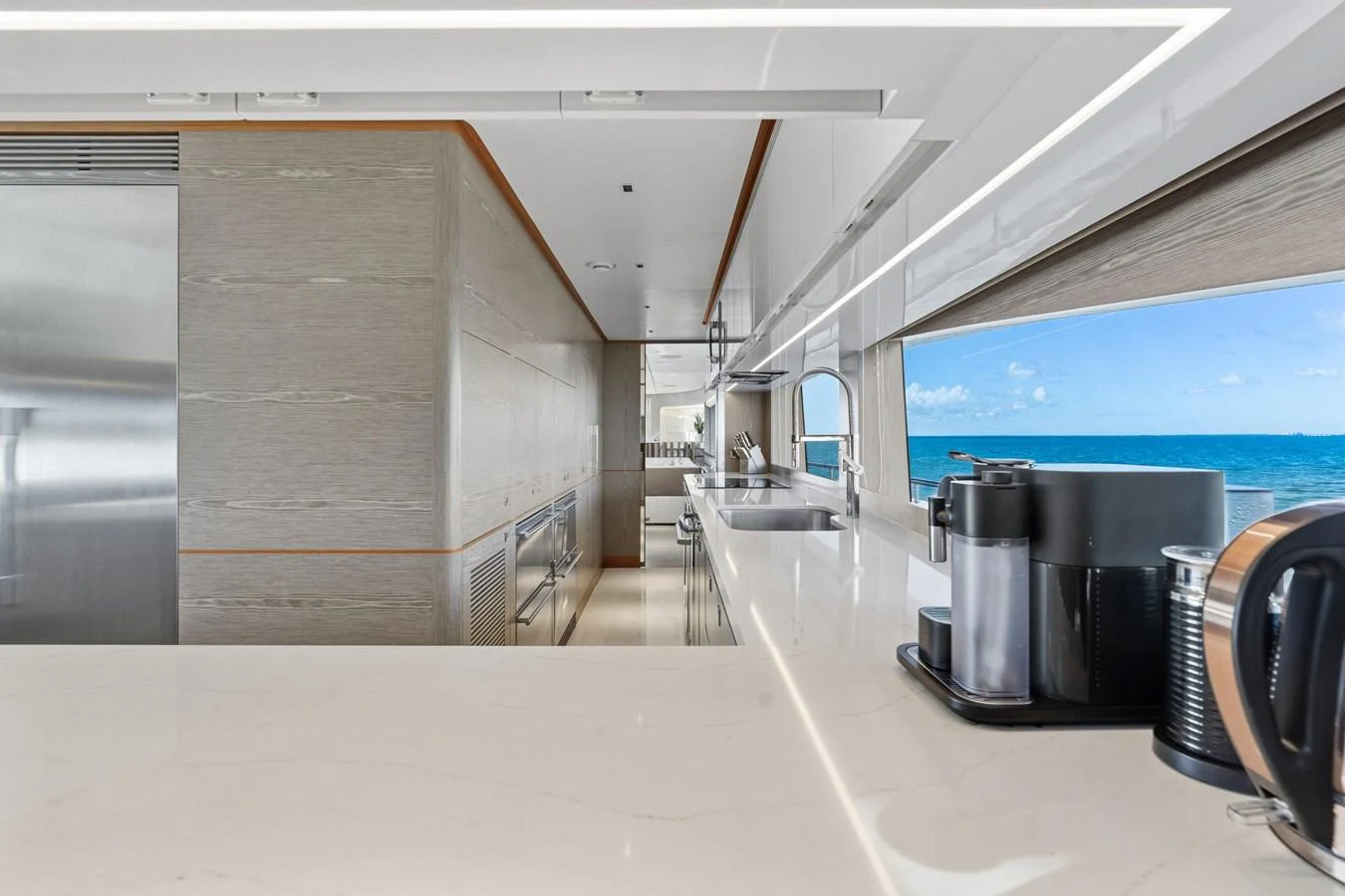 a large room with large windows aboard WILD DUCK Yacht for Sale