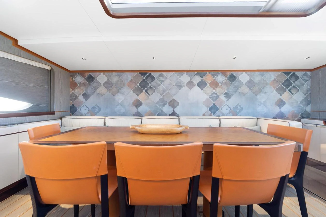 a table with chairs and a counter aboard WILD DUCK Yacht for Sale
