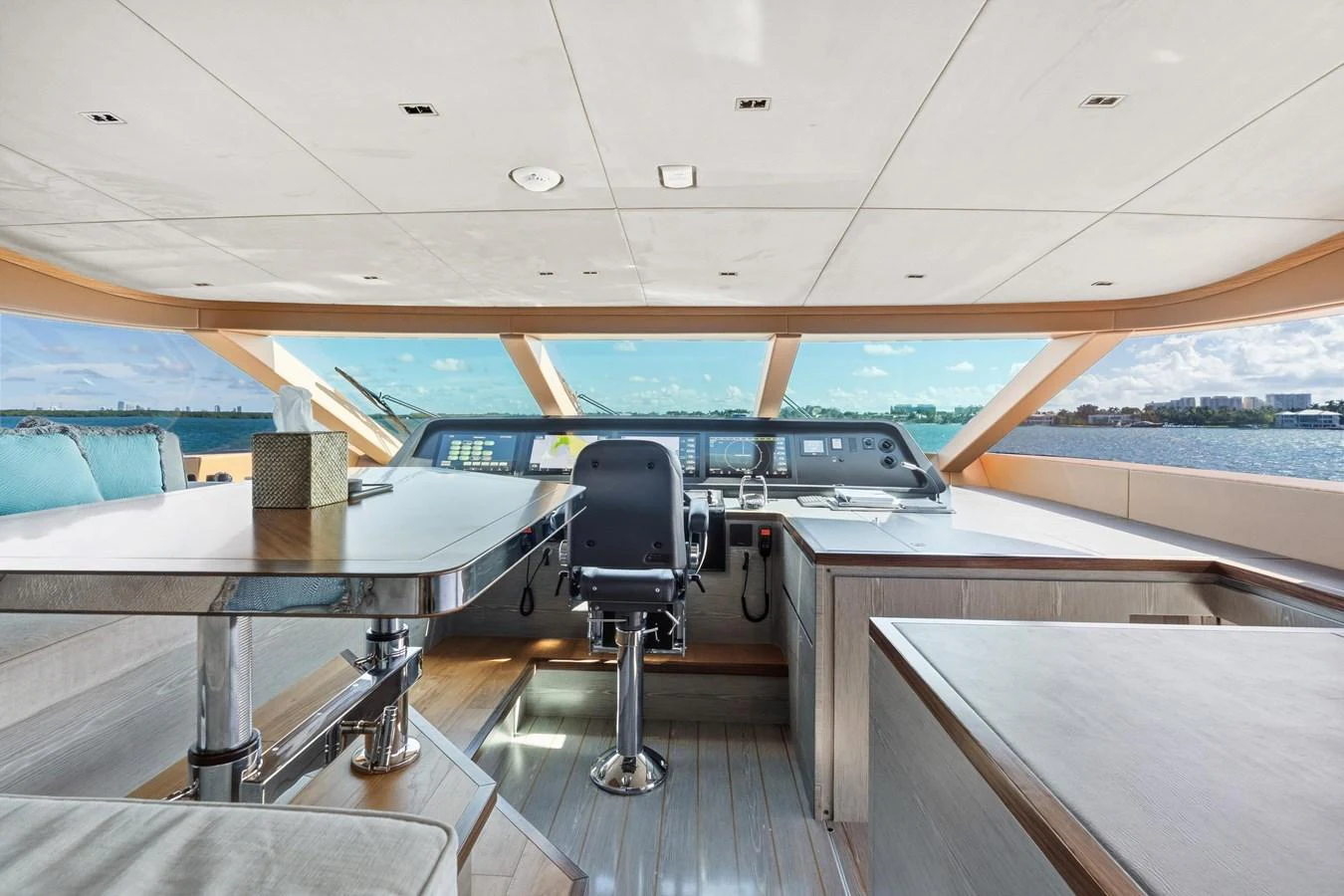a room with a desk and chairs aboard WILD DUCK Yacht for Sale