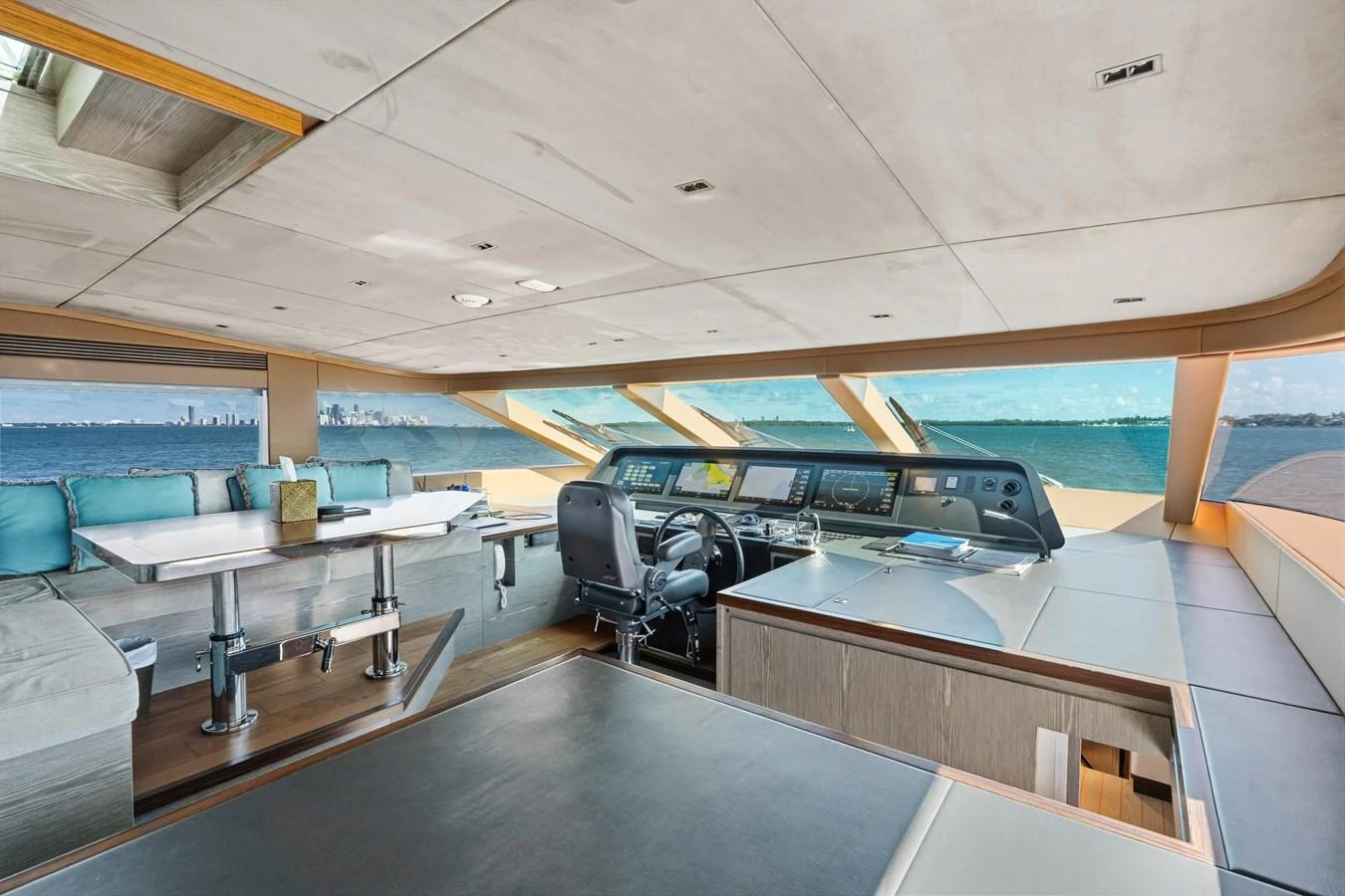a room with a large desk and a couple of jets aboard WILD DUCK Yacht for Sale
