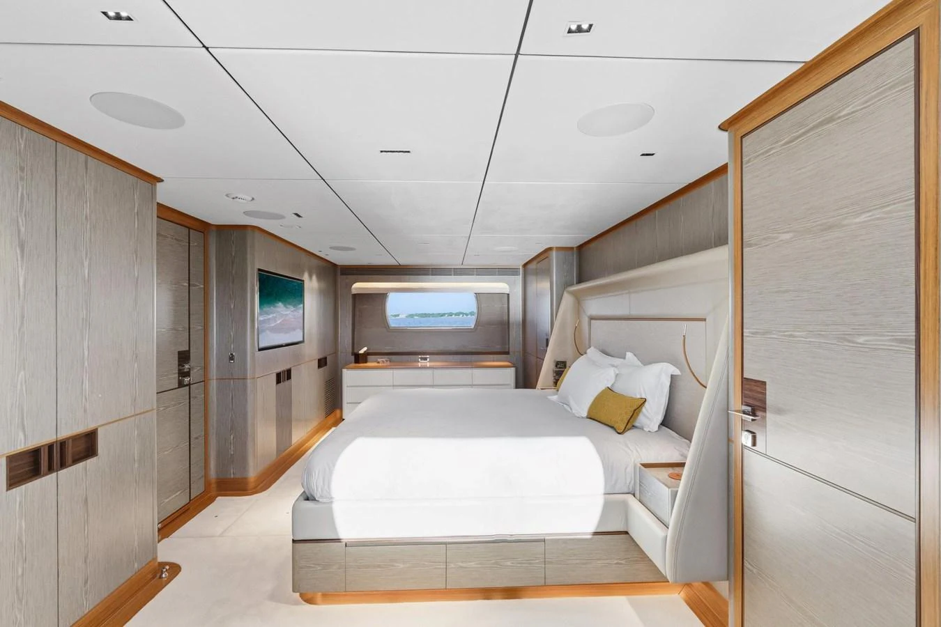 a room with a bed and a television aboard WILD DUCK Yacht for Sale