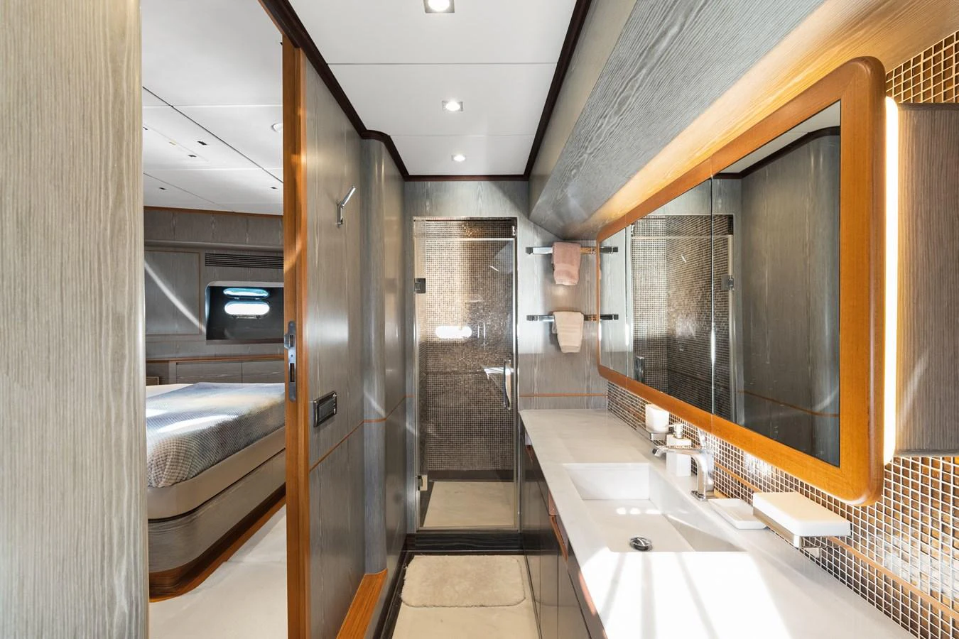 a bathroom with a large mirror aboard WILD DUCK Yacht for Sale