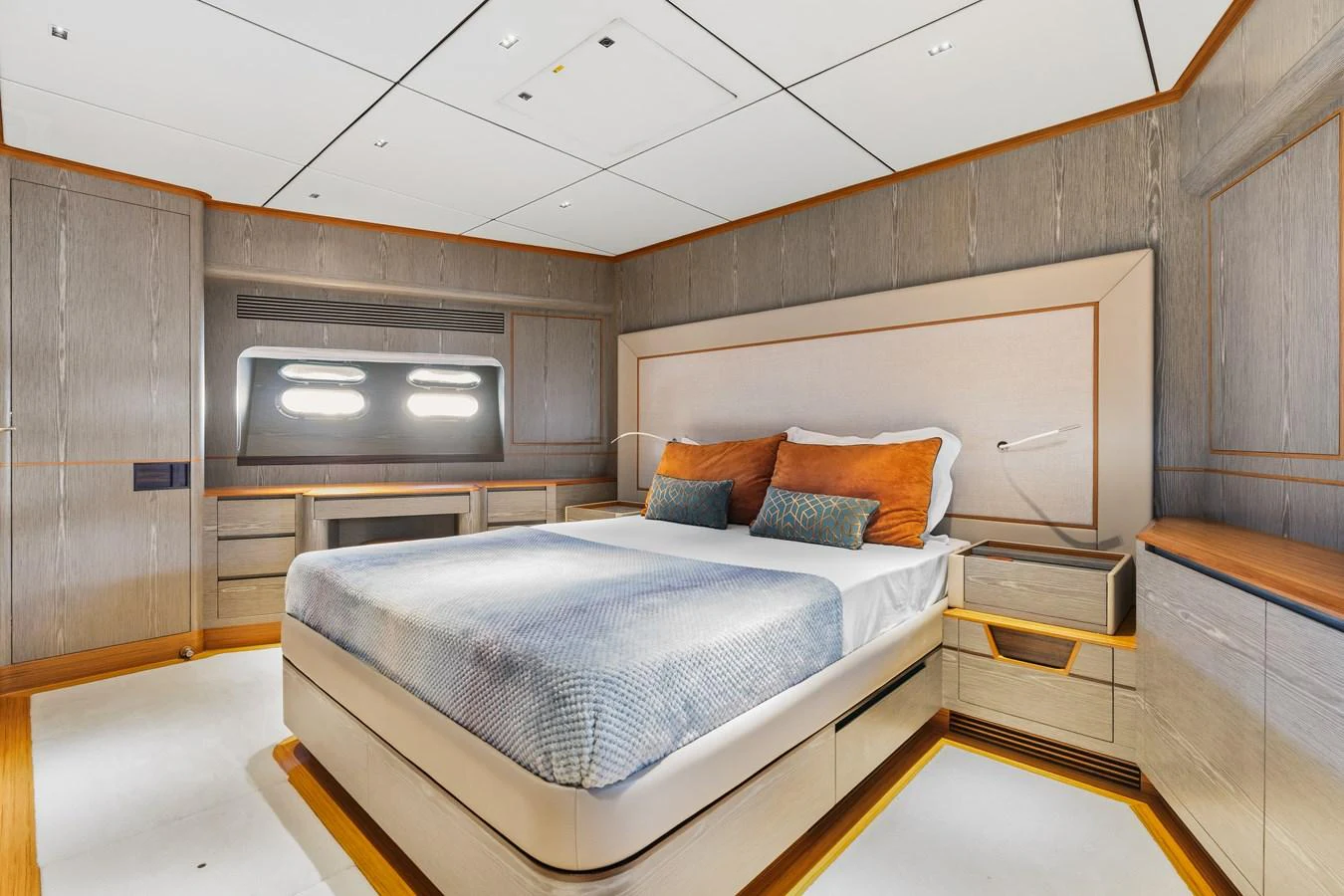 a room with a bed and a desk aboard WILD DUCK Yacht for Sale