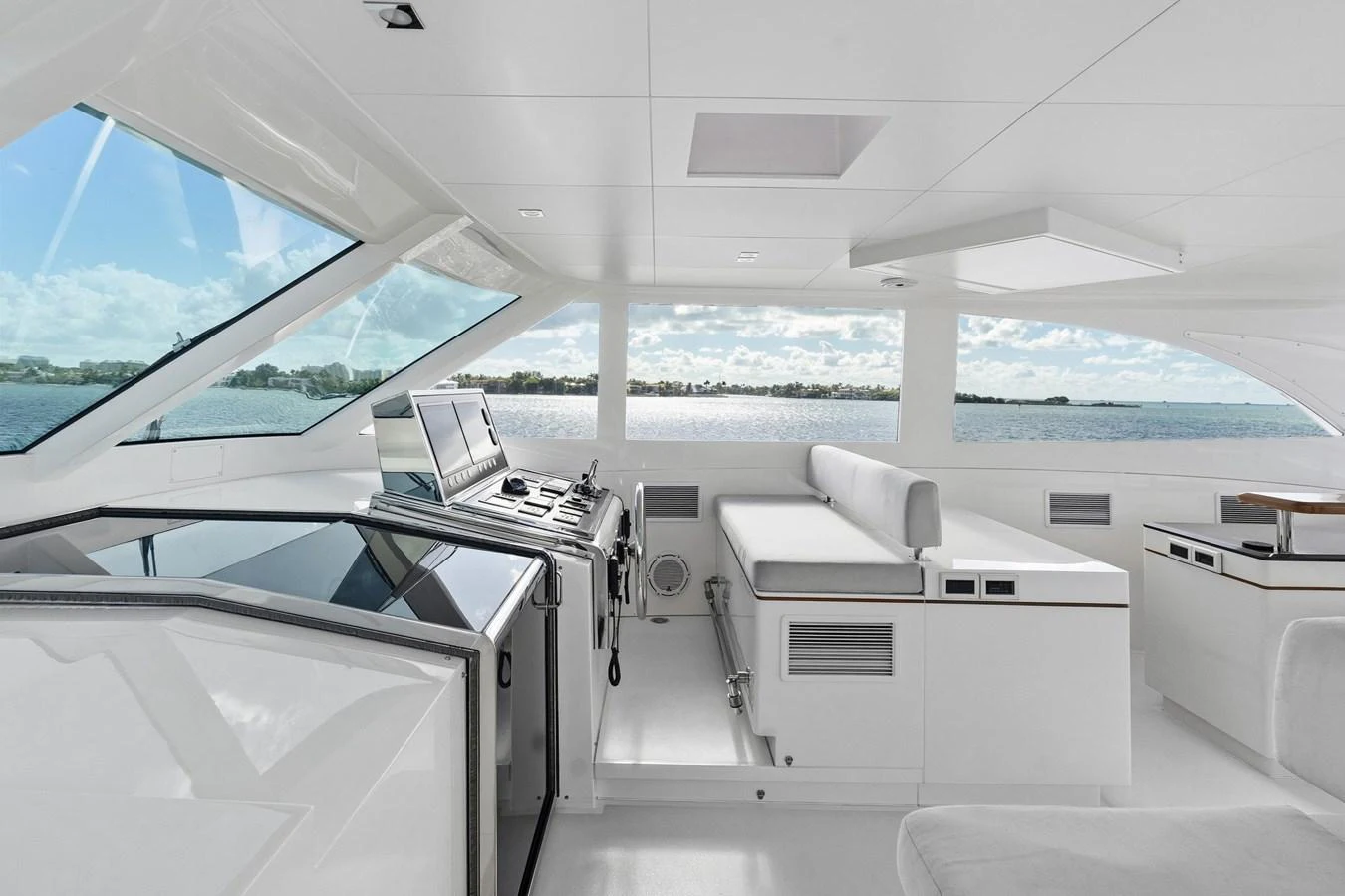 inside of a white car aboard WILD DUCK Yacht for Sale