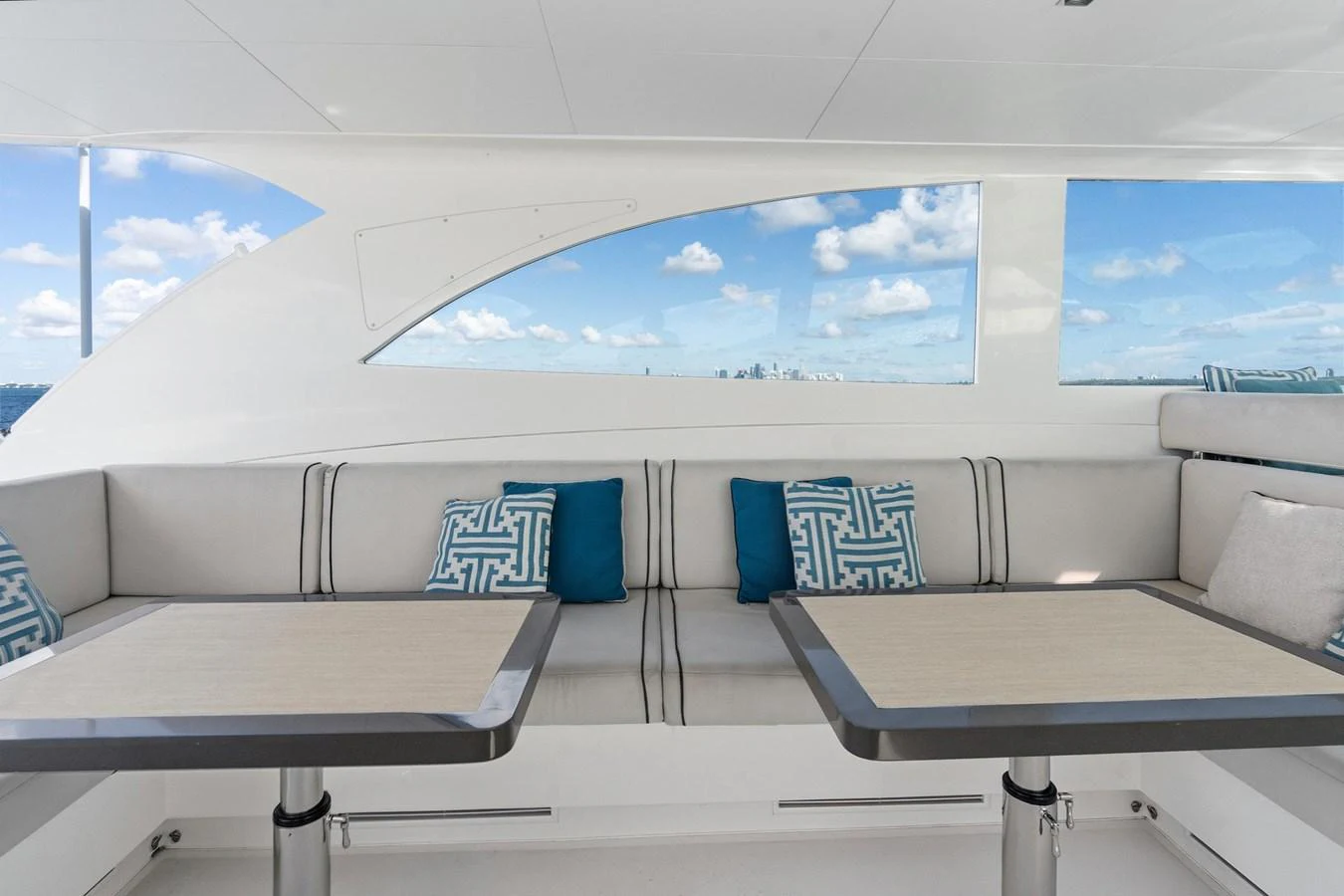 a room with a table and chairs aboard WILD DUCK Yacht for Sale