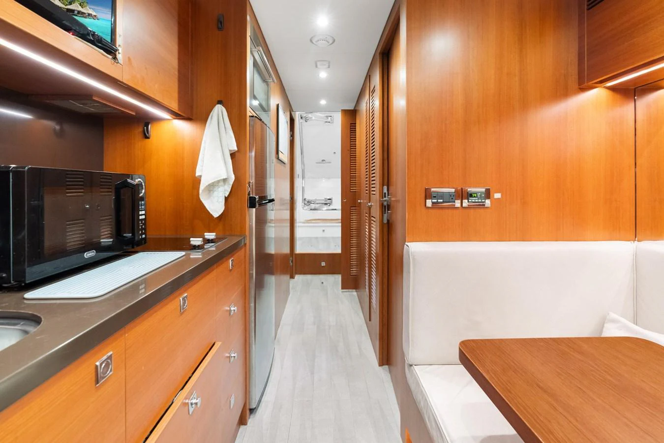 a bathroom with a bathtub and sink aboard WILD DUCK Yacht for Sale